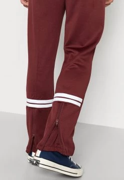 Sergio Tacchini ORION TRACKPANT - Tracksuit Bottoms - Port -Sergio Tacchini Sales 1680e751f8af407b9663c932eaa93ee6