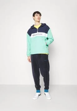 Sergio Tacchini DELFINO VELOUR TRACKPANT - Tracksuit Bottoms - Night Sky/blue Sapphire -Sergio Tacchini Sales 544267f8c94b47bdaa34cc2cfb55627c