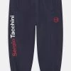 Sergio Tacchini NERSON PANT UNISEX - Tracksuit Bottoms - Night Sky/tango Red -Sergio Tacchini Sales 64e65db5d7d84999b0e49d34e3479a3f