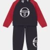 Sergio Tacchini BABY TRACKSUIT SET UNISEX - Tracksuit - Night Sky/tango Red -Sergio Tacchini Sales 64ff7ac8cac546a486b3e248e22f12db