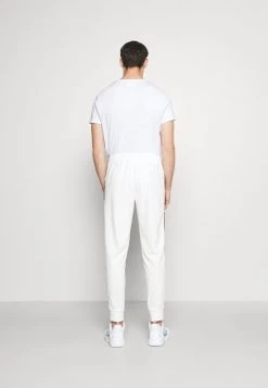 Sergio Tacchini TRACK PANTS YOUNGLINE - Tracksuit Bottoms - Blanc De Blanc/night Sky -Sergio Tacchini Sales 6a9d16e4c5b94ea98b90f6c4e9008e24