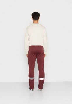 Sergio Tacchini ORION TRACKPANT - Tracksuit Bottoms - Port -Sergio Tacchini Sales 6c7373c0d1b04b6494670f0b70b79cf5