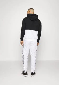 Sergio Tacchini RIPETIZIONE PANTS - Tracksuit Bottoms - White/black -Sergio Tacchini Sales 7bdd95e3ab7a4a4a852b01b9c023c82e