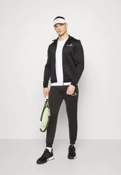 Sergio Tacchini DONET PANTS - Tracksuit Bottoms - Black/white -Sergio Tacchini Sales 8e5e40e36bcd46b990325d963ec7d913