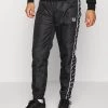 Sergio Tacchini RIPETIZIONE PANTS - Tracksuit Bottoms - Black/white -Sergio Tacchini Sales df7c9ea2ba414540bfd701dc04cab9f7
