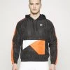 Sergio Tacchini EQUILATERO TRACK JACKET - Training Jacket - Black/orange -Sergio Tacchini Sales e439037b7a834304ac3897d1b31c1847
