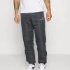 Sergio Tacchini CARSON PANTS - Tracksuit Bottoms - Ebony/white 11 Sergio Tacchini CARSON PANTS - Tracksuit Bottoms - Ebony/white -Sergio Tacchini Sales e8cb05d5b83c42a3a361a14d8a7acd62