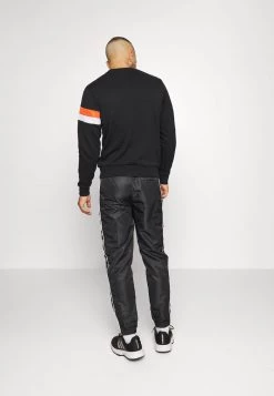 Sergio Tacchini RIPETIZIONE PANTS - Tracksuit Bottoms - Black/white -Sergio Tacchini Sales f5a9658c71d940f6a01ac379f0a1df68