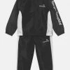 Sergio Tacchini NUXUN TRACKSUIT SET UNISEX - Tracksuit - Anthracite/ebony -Sergio Tacchini Sales f68fe1cfc2ad4290bfda4ebc2b38215e